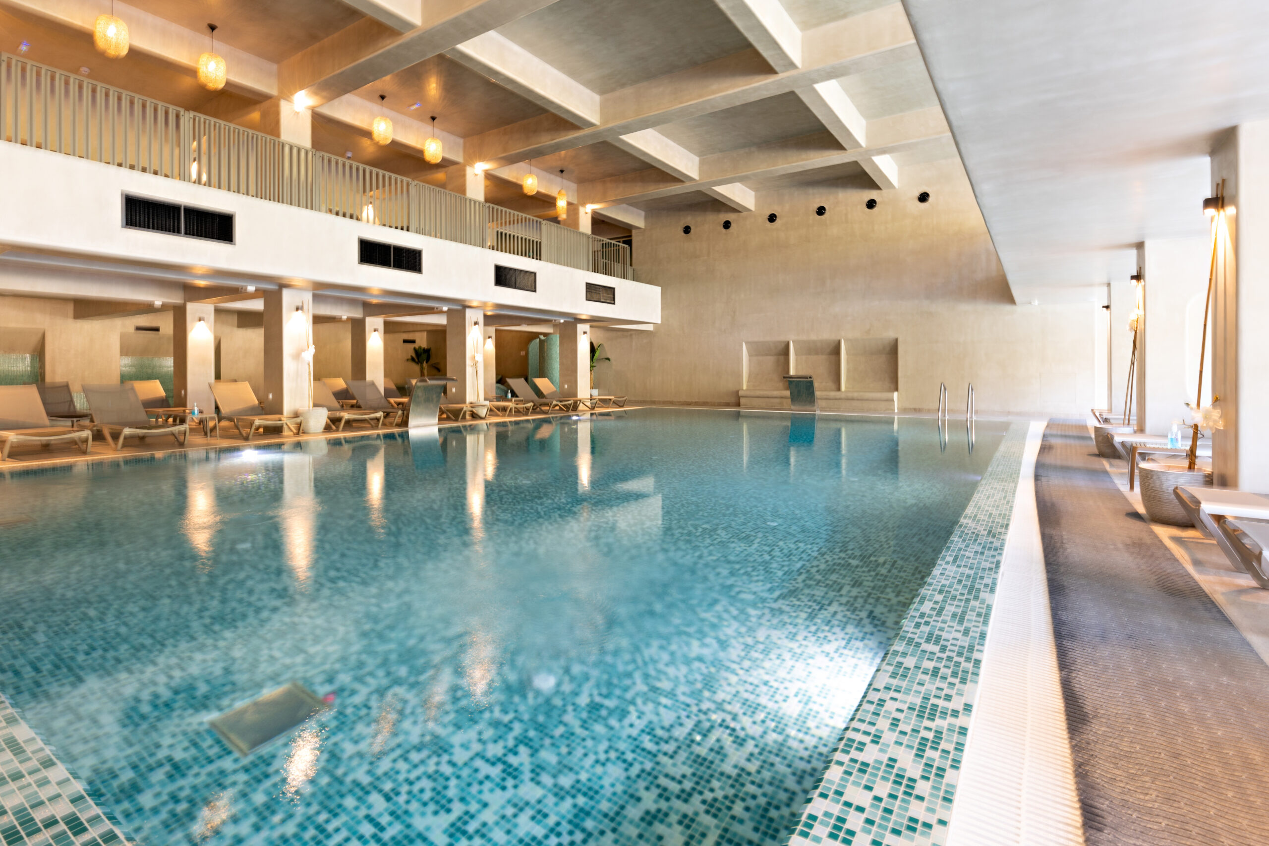 Indoor swimming pool in hotel spa and wellness center